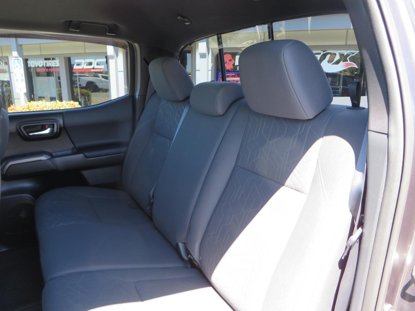 2017 CHARCOAL /GREY Toyota Tacoma TRD OFF-ROAD Double Cab Long Bed V6 6AT 4WD (3TMDZ5BN3HM) with an 3.5L V6 engine, automatic transmission, located at 2630 Grass Valley Highway, Auburn, CA, 95603, (530) 508-5100, 38.937893, -121.095482 - TRD Off-road Tacoma with a level kit, 17" Fuel Vector wheels, Falken Wildpeak AT tires, N-Fab running boards, Roll Up tonneau cover, BedRug, and window Deflectors. - Photo#37